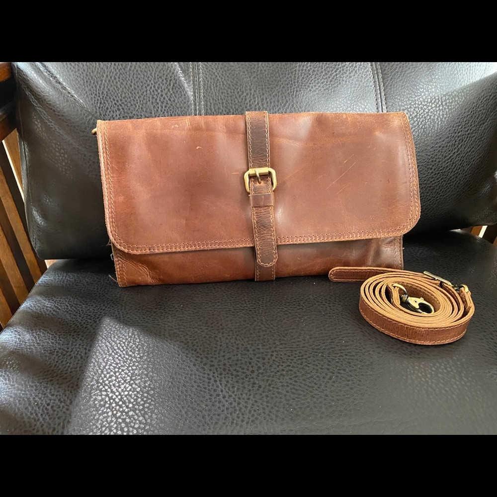 The leather store crossbody clutch